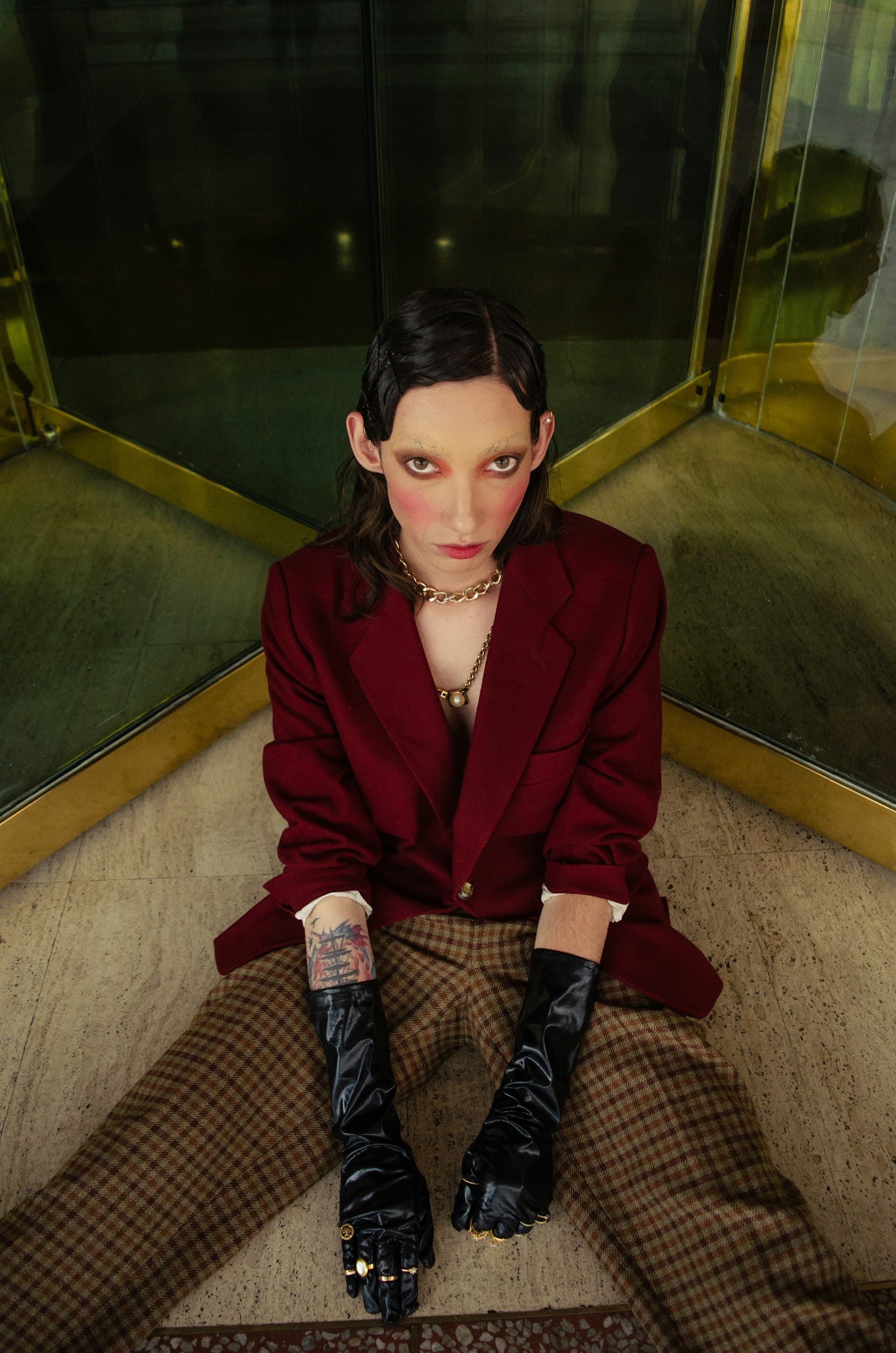 Editorial photoshoot on location - burgundy jacket and layered styling, fashion photography