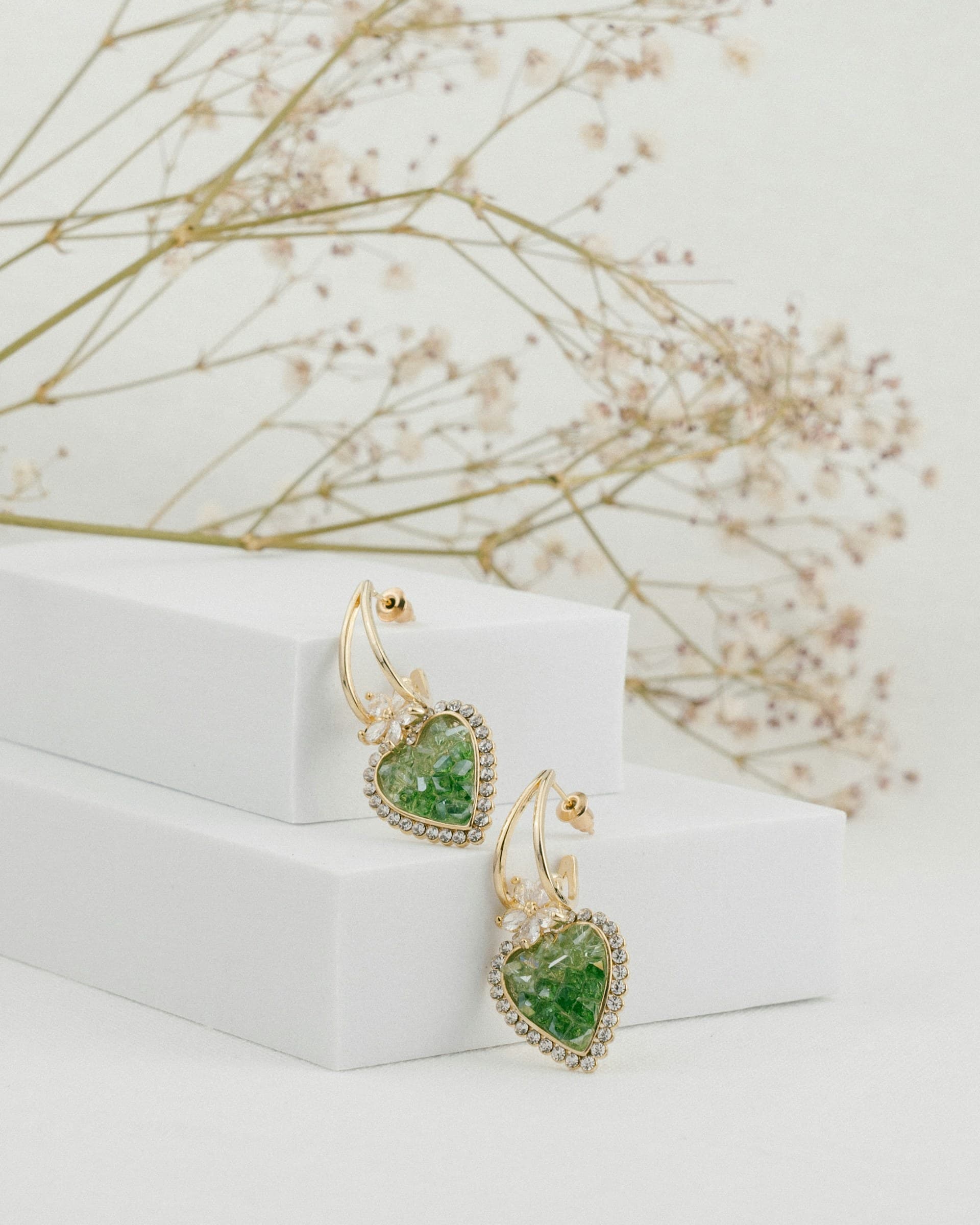 Earrings with green stones, macro detail - macro photography
