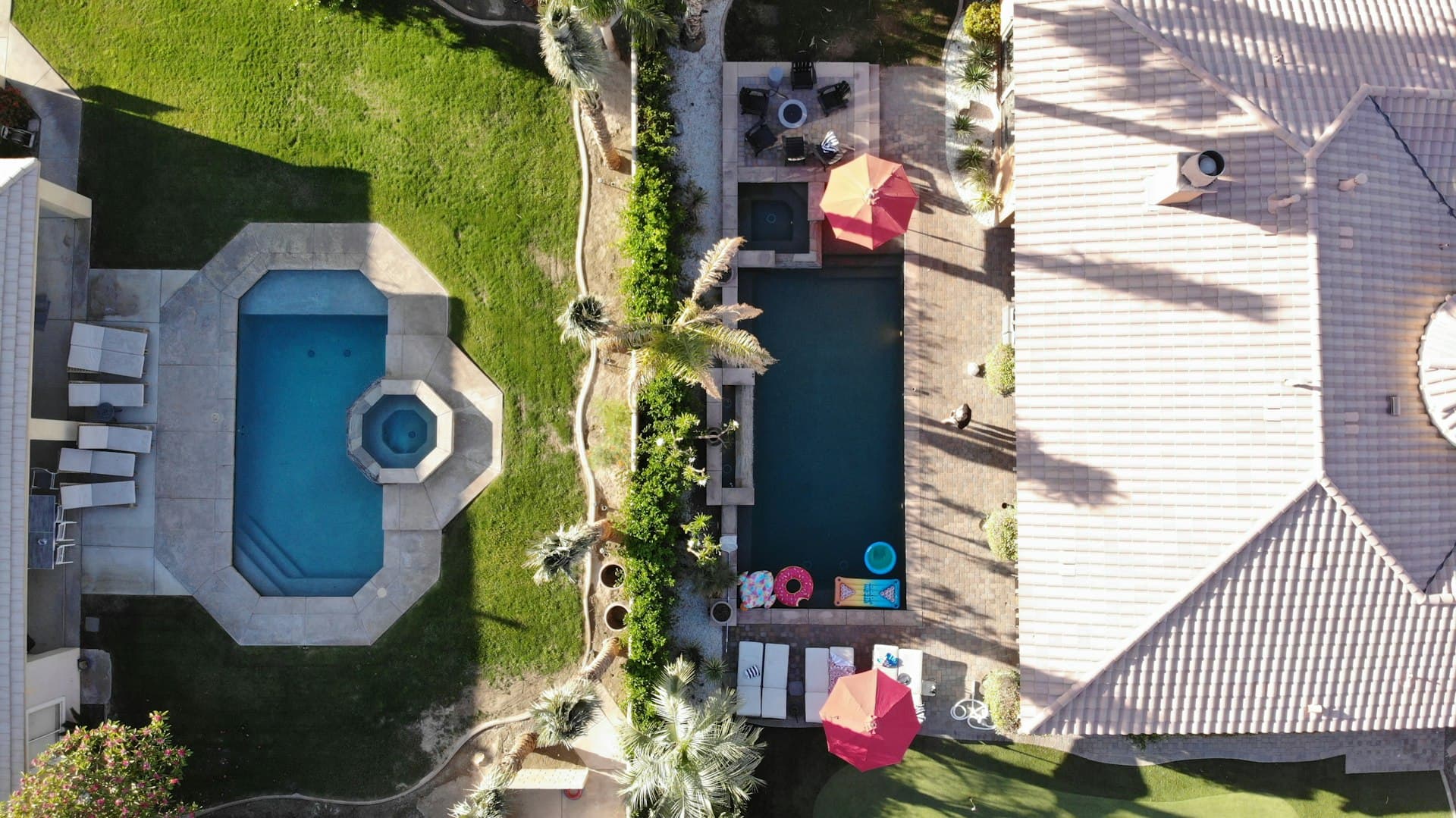 Real estate photography - modern house with pool from the air