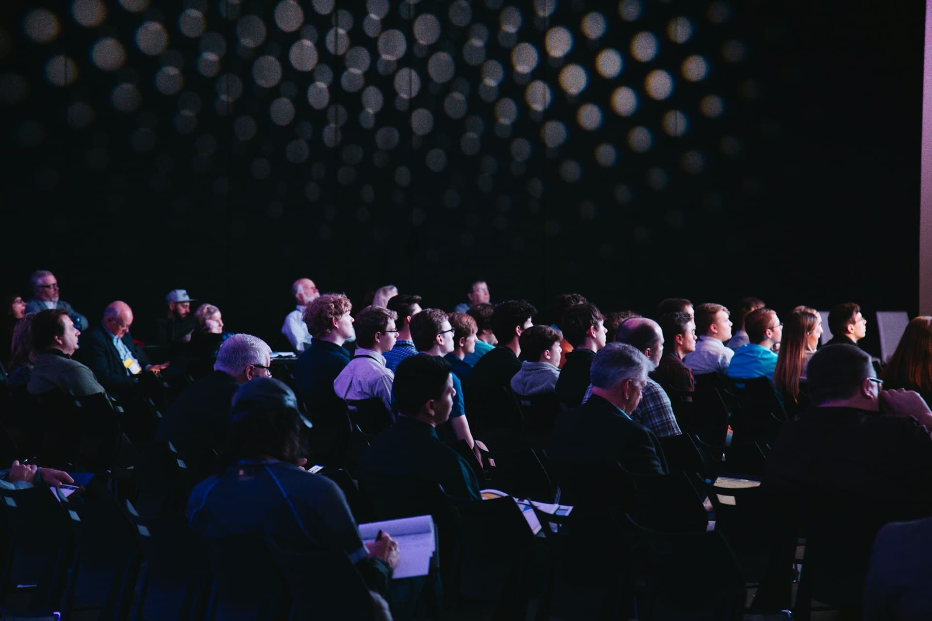 Conference audience in the hall, photographed by Emma Studio