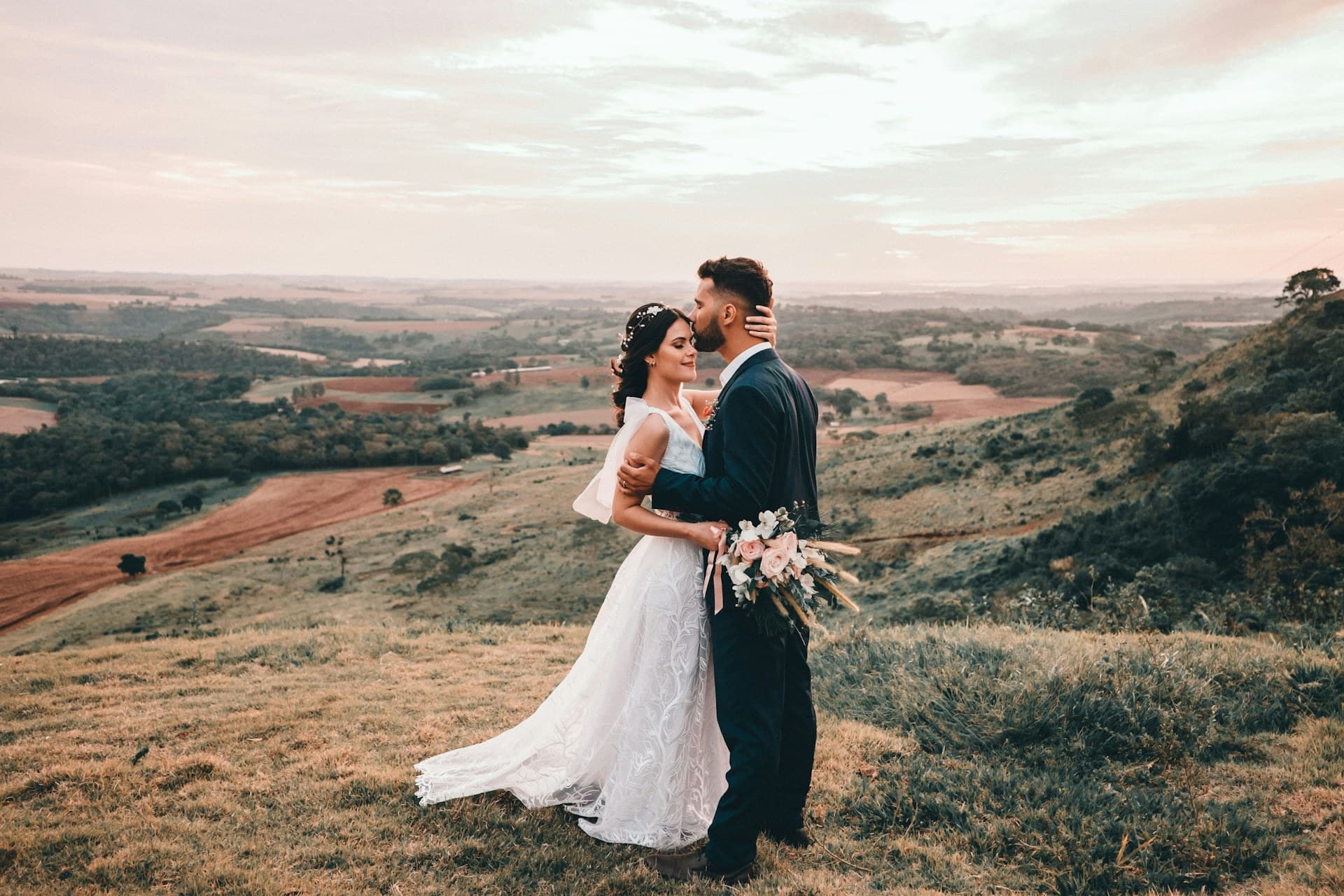 A couple standing together at their wedding ceremony